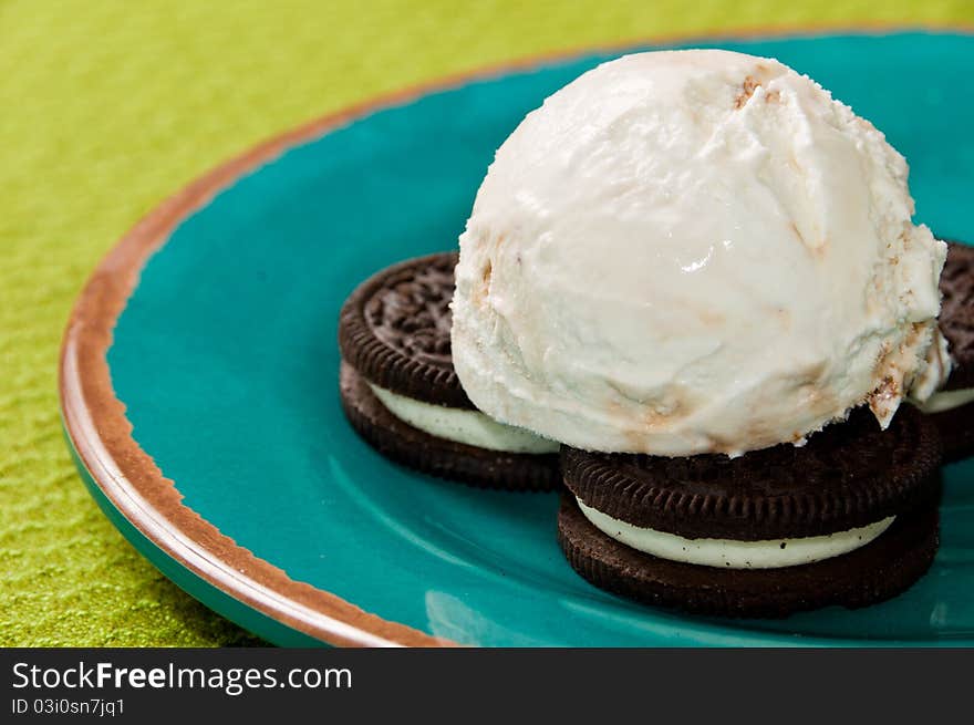 Ice Cream with Cookies on a Blue Plate