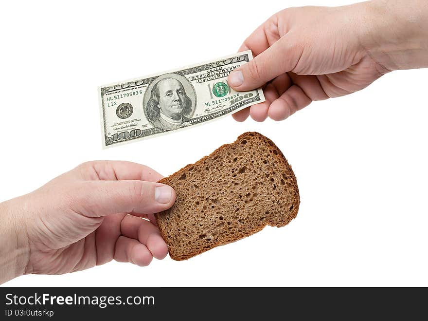 Hands hold the dollar and bread