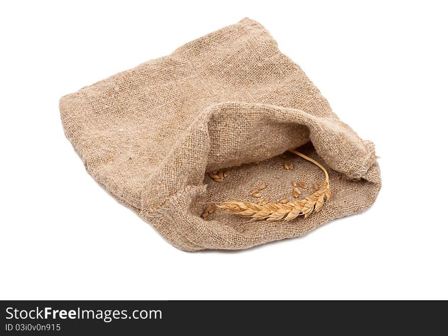 Sack with wheat grains and ears