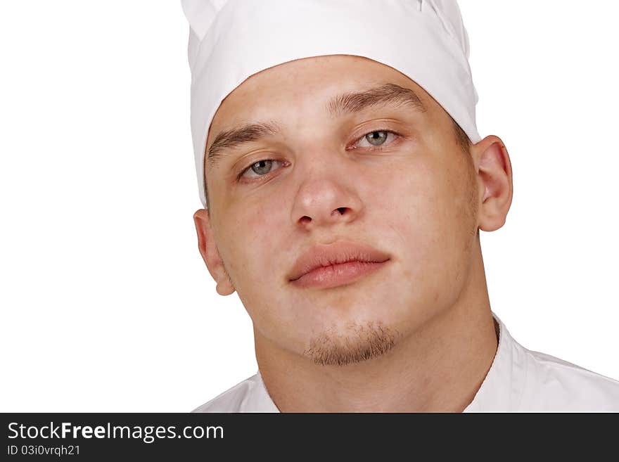 Face of the young cooks in chef's hat.