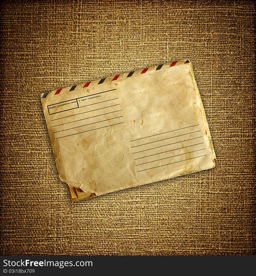 Vintage envelop on brown canvas