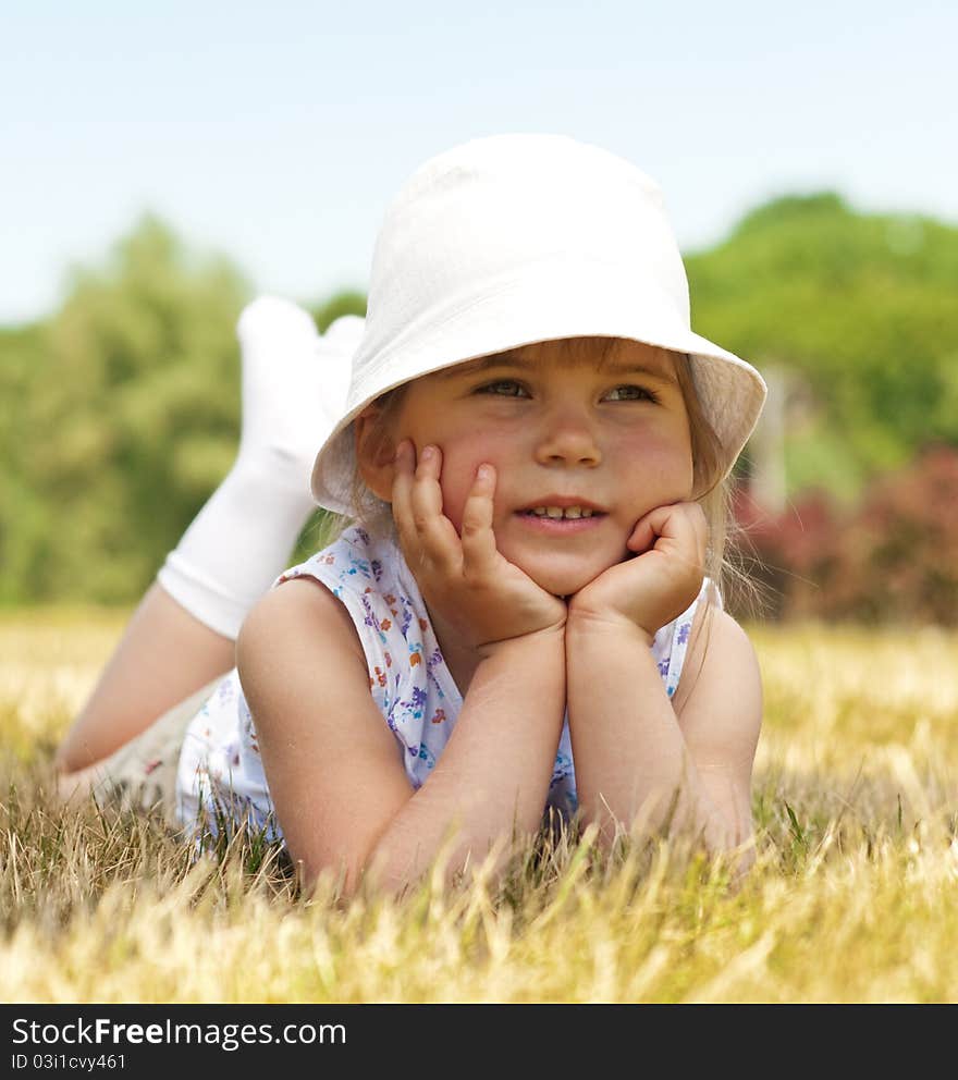 Little adorable girl in the park