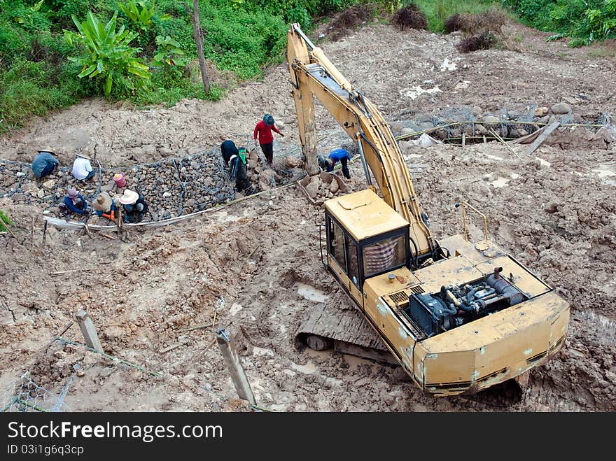 Construction site with yellow tractors