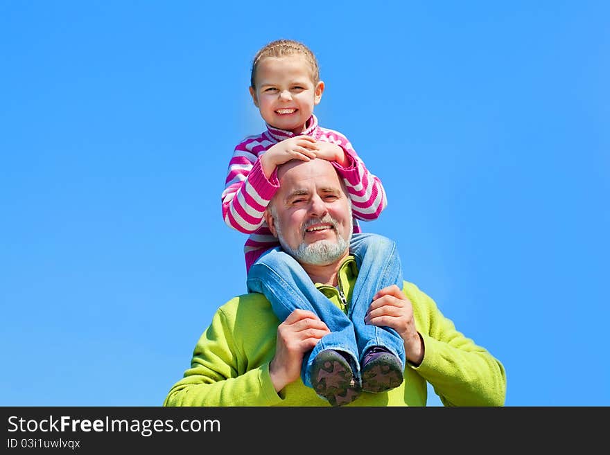 Grandfather and grandaugther happy together