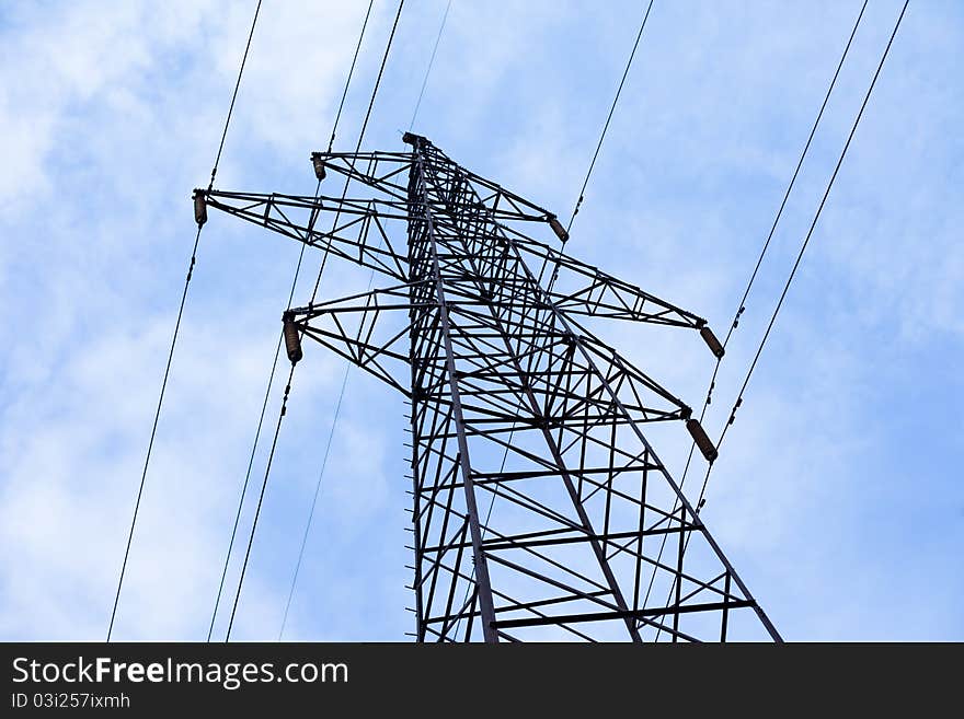 Transmission power line on sky background