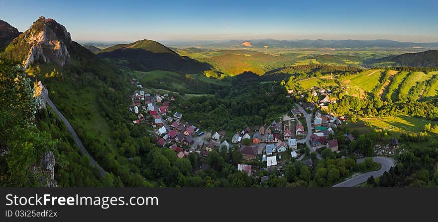 Landscape with village, mountains and blu sky