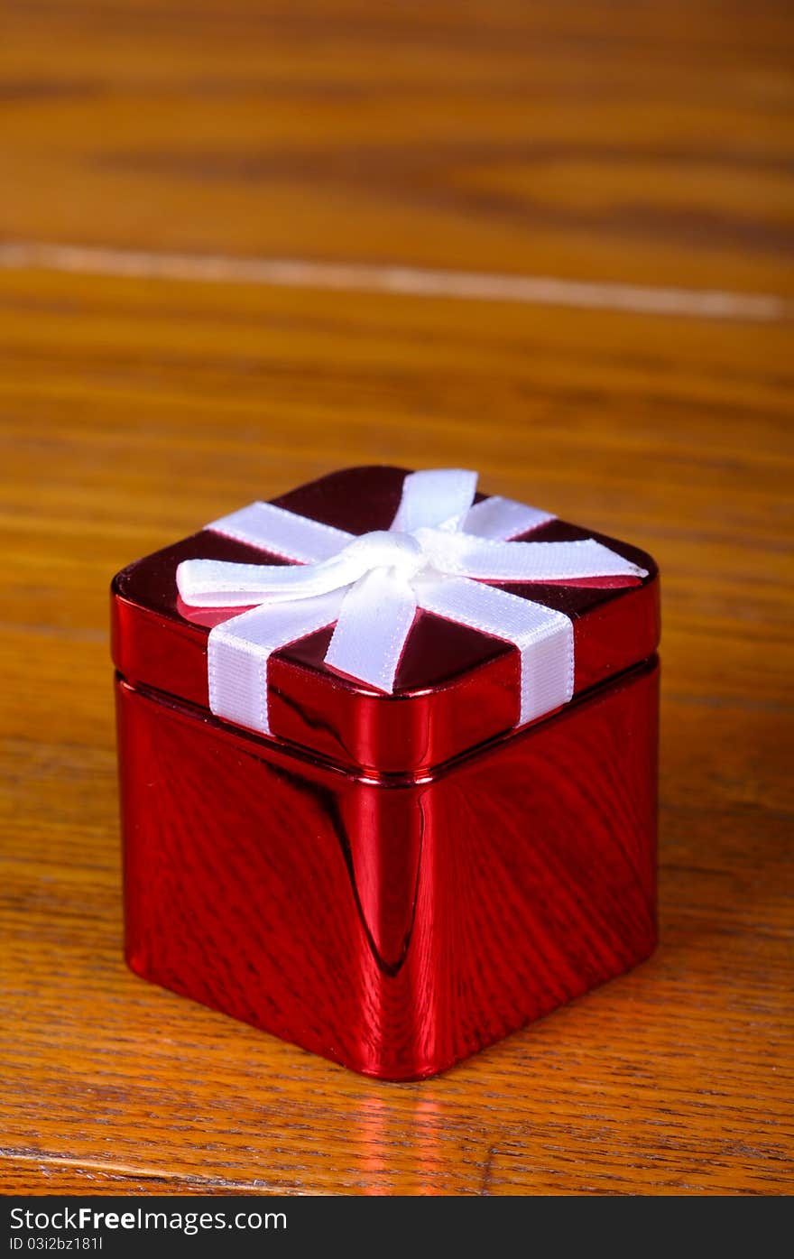 Tin Christmas boxes on old vintage table