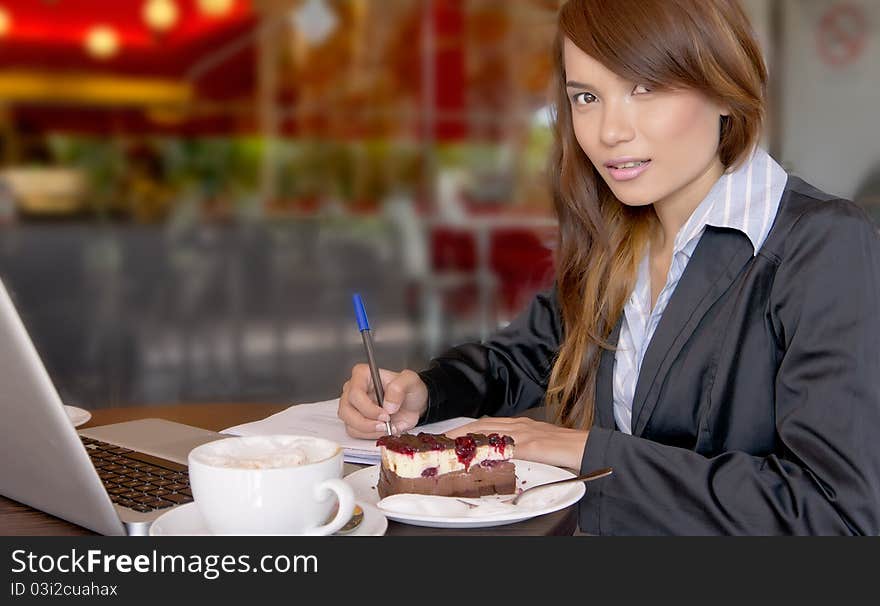 Confidence look of young Asian businesswoman working outside.