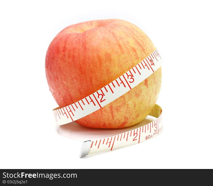 Apple and a measure tape, diet concept