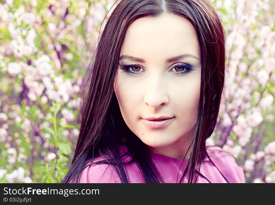 Portrait Of A Girl In A Flowered Garden