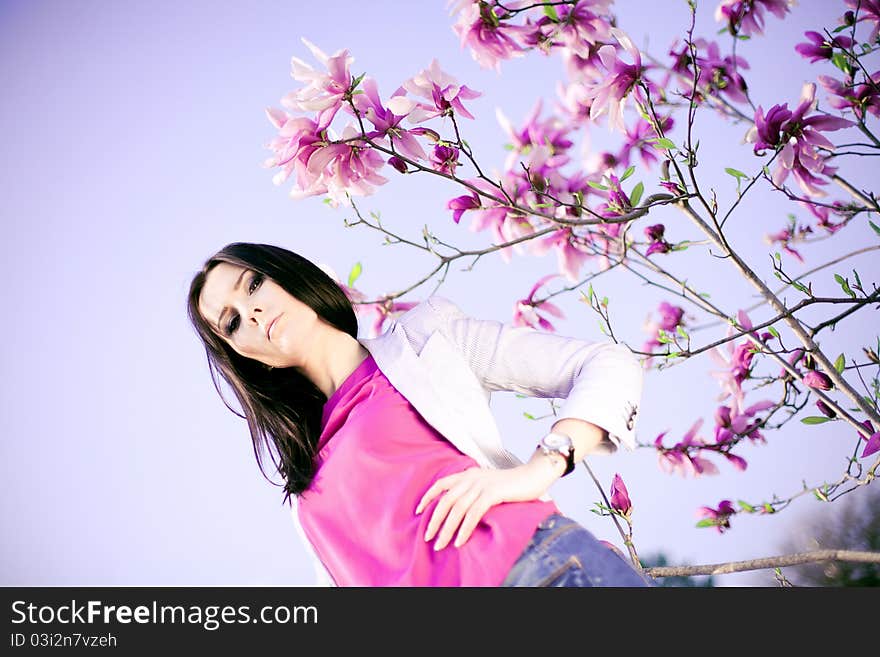 Fashionable Girl and  purple flowers