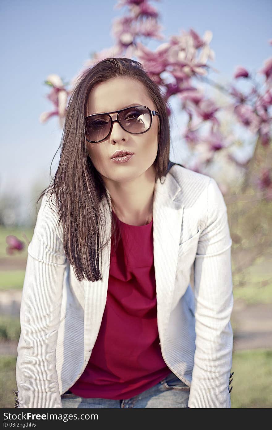 Beautiful brunette girl  in sunglasses