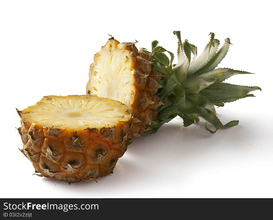 Cut off pineapple on the white background