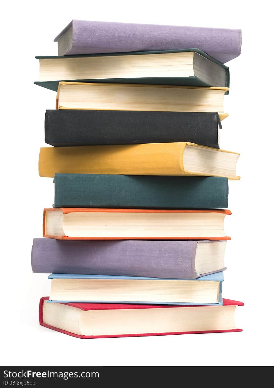 Stacked old books on white background