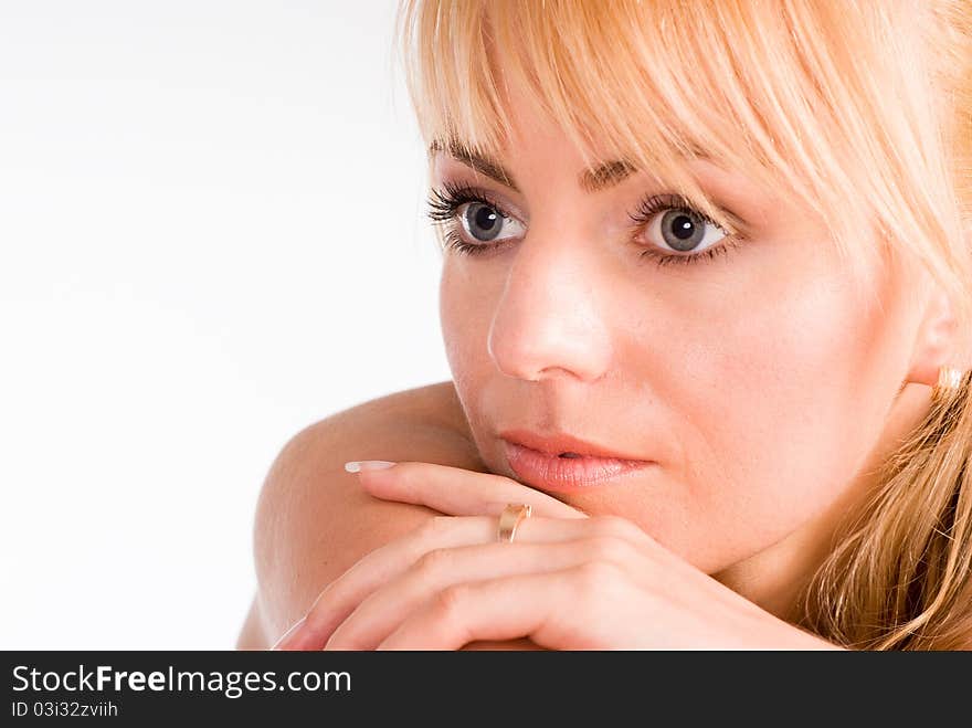 Nice blonde girl posing on a white background. Nice blonde girl posing on a white background