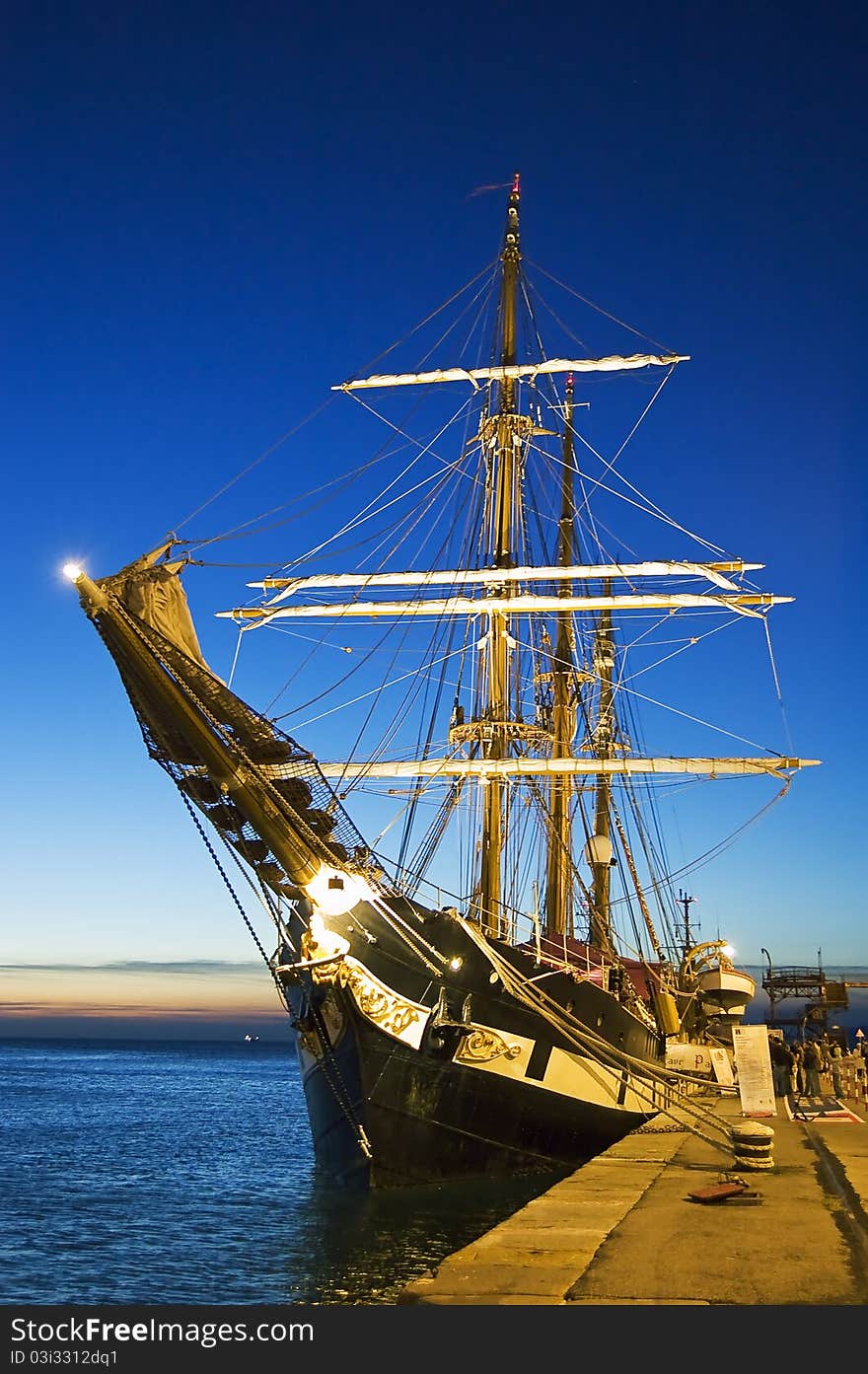 Moored sailing ship at sunset. Moored sailing ship at sunset