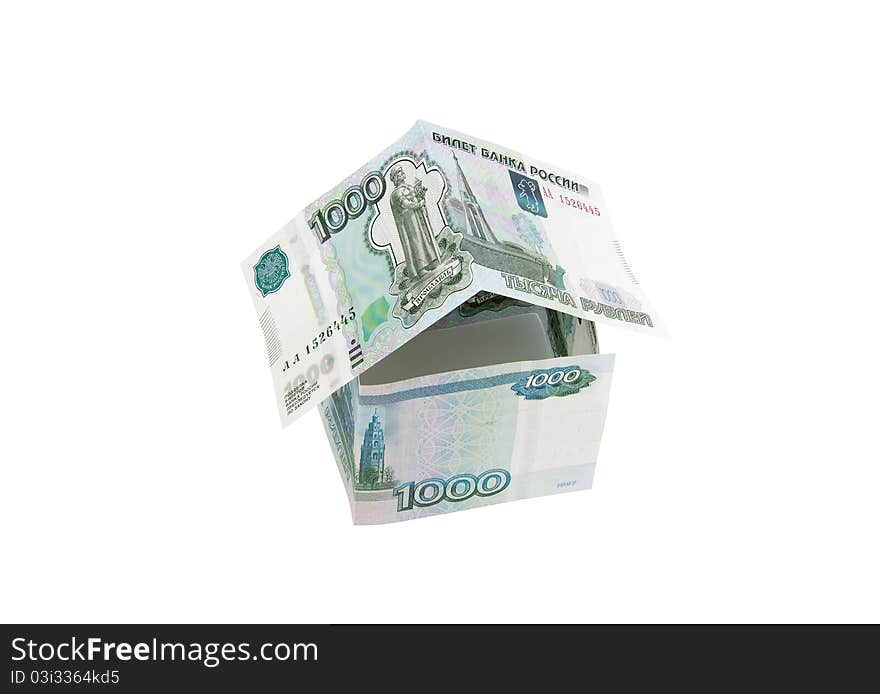 Money in the form of house on a white background