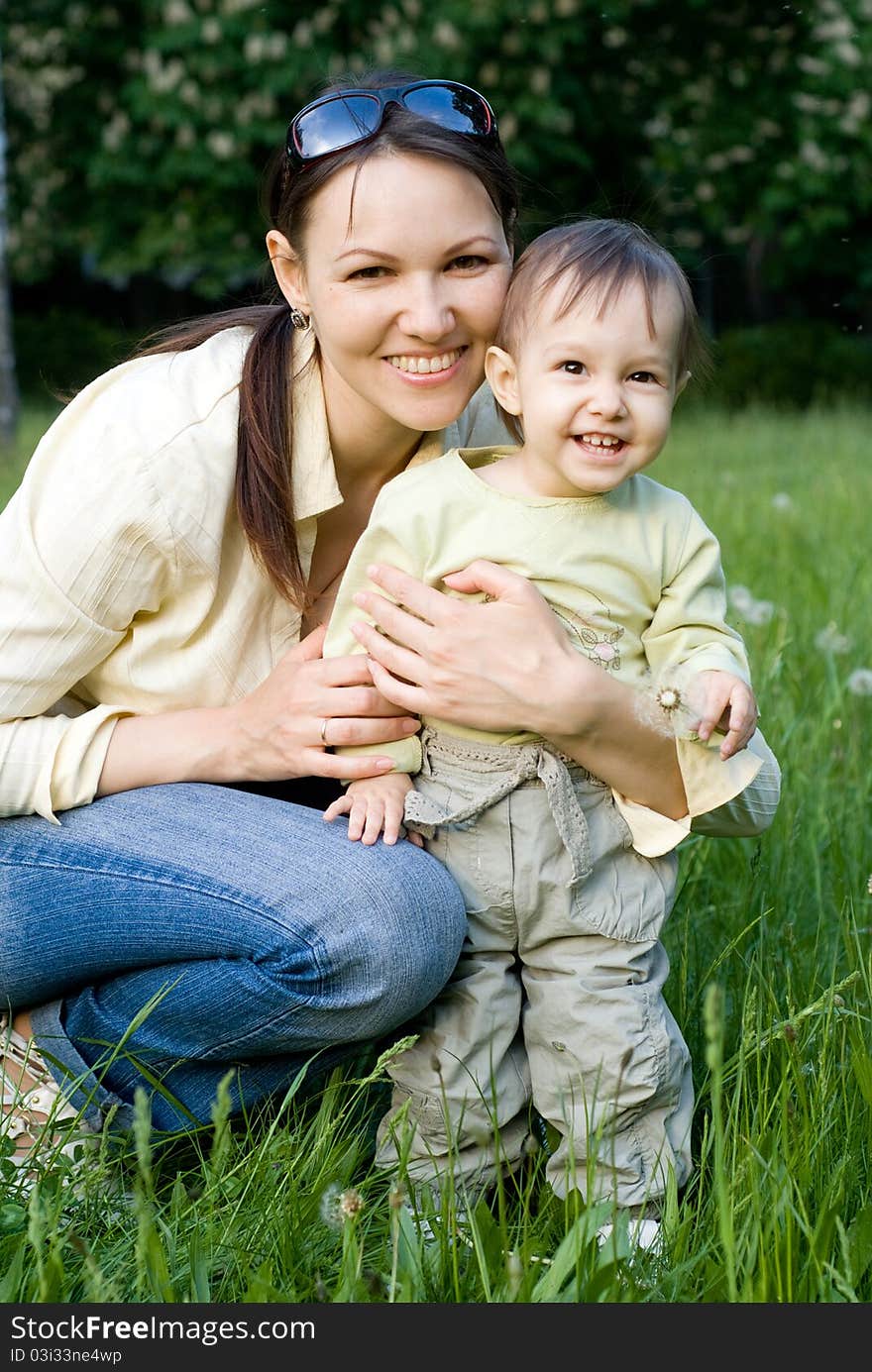 Nice portrait of a cute mom and her baby. Nice portrait of a cute mom and her baby