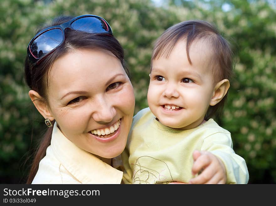 Nice portrait of a cute mom and her baby. Nice portrait of a cute mom and her baby