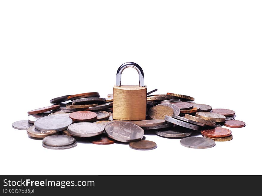 A closed lock on a bunch of coins. A closed lock on a bunch of coins