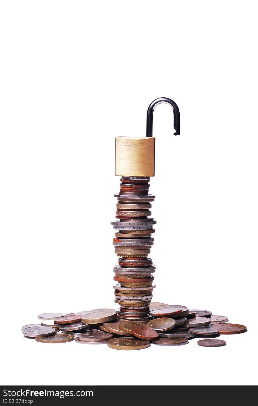 An open lock on top of a stack of coins. An open lock on top of a stack of coins