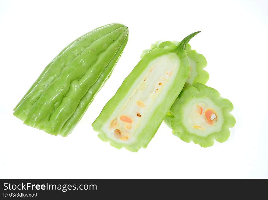 Bitter Gourd With Sectional Cut Showing The Seeds Within. Bitter Gourd With Sectional Cut Showing The Seeds Within