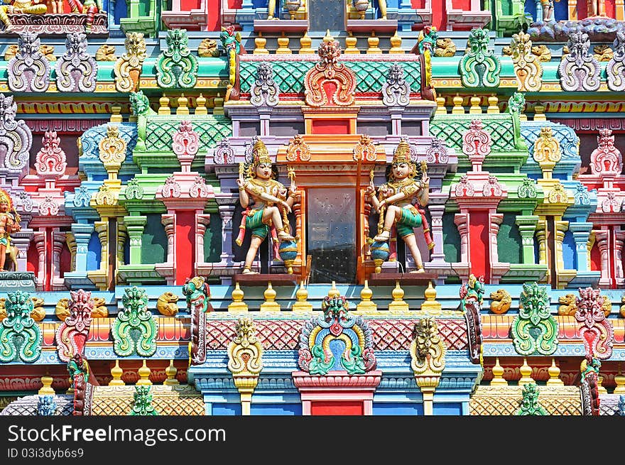 Closeup Of Hindu Deities On The Facade Of A Temple