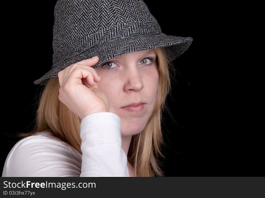 Pretty Girl in a White Shirt and a Hat