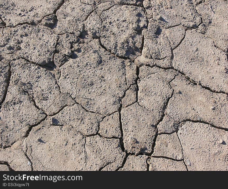 Dry broken soil.