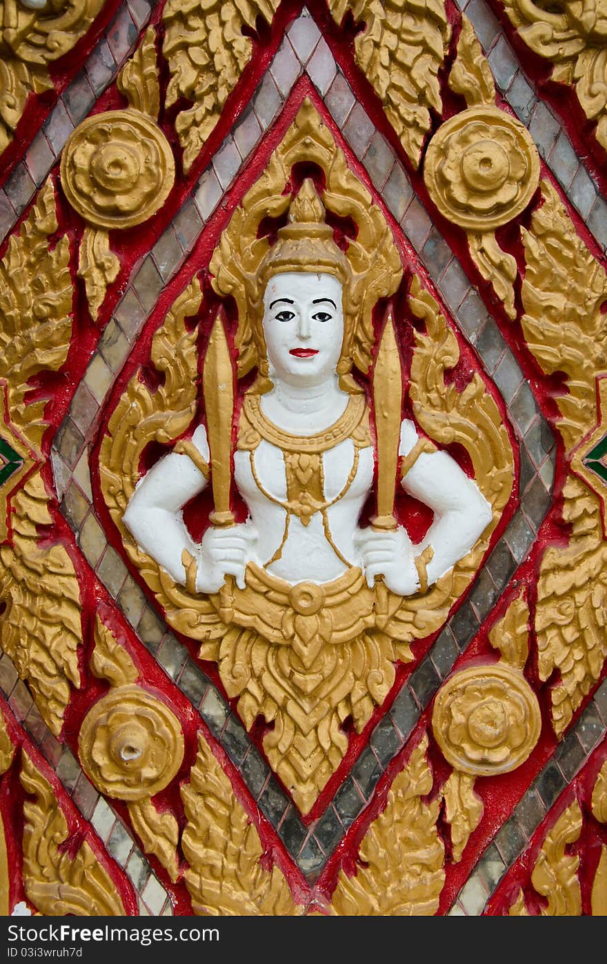 Divinity on tample wall,thailand