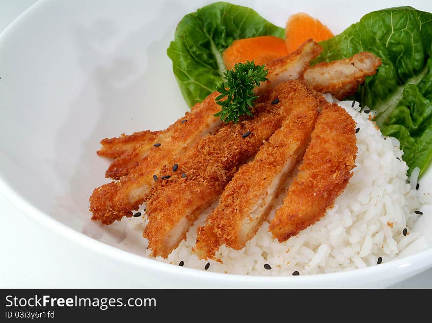 Fried meat serve with white rice. Fried meat serve with white rice