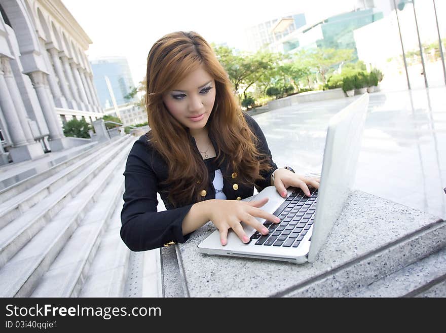 Using laptop at outdoor