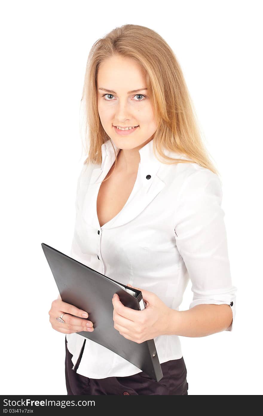 Young business woman standing with folder and smiling. Young business woman standing with folder and smiling