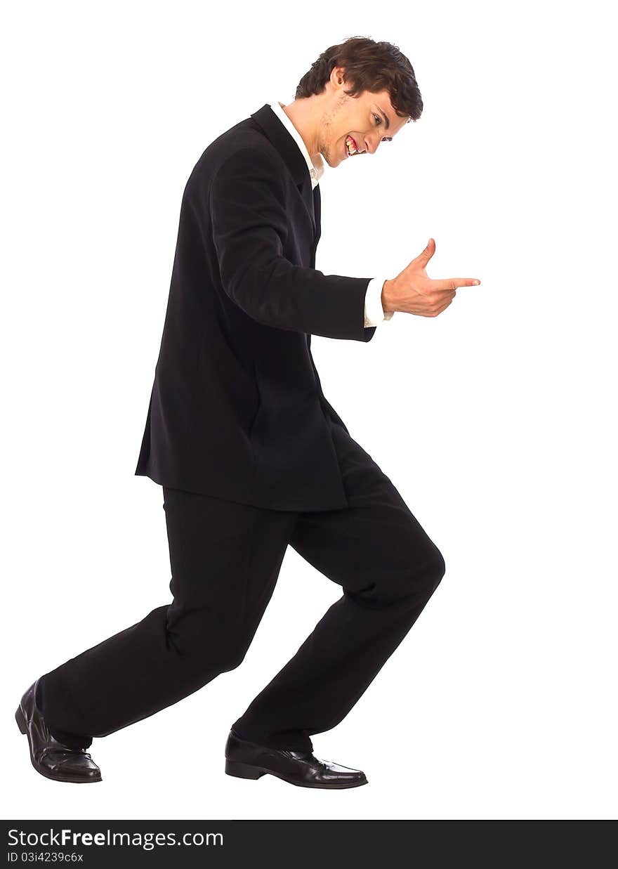 Successful businessman pointing to the right standing on white background