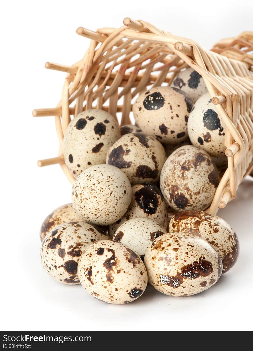 Quail eggs isolated on white background