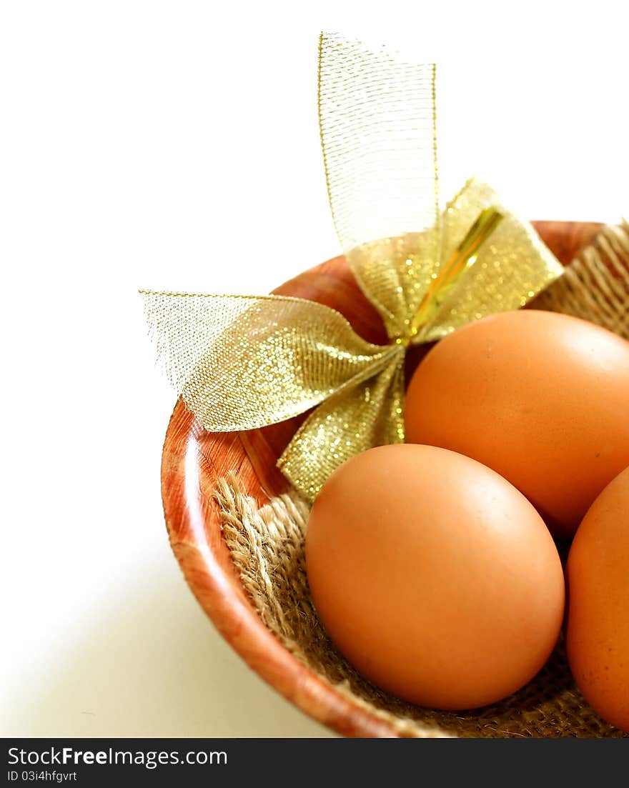 Eggs In Bowl Isolated On White