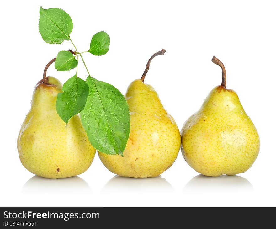 Yellow pears with green leafs isolated on white background