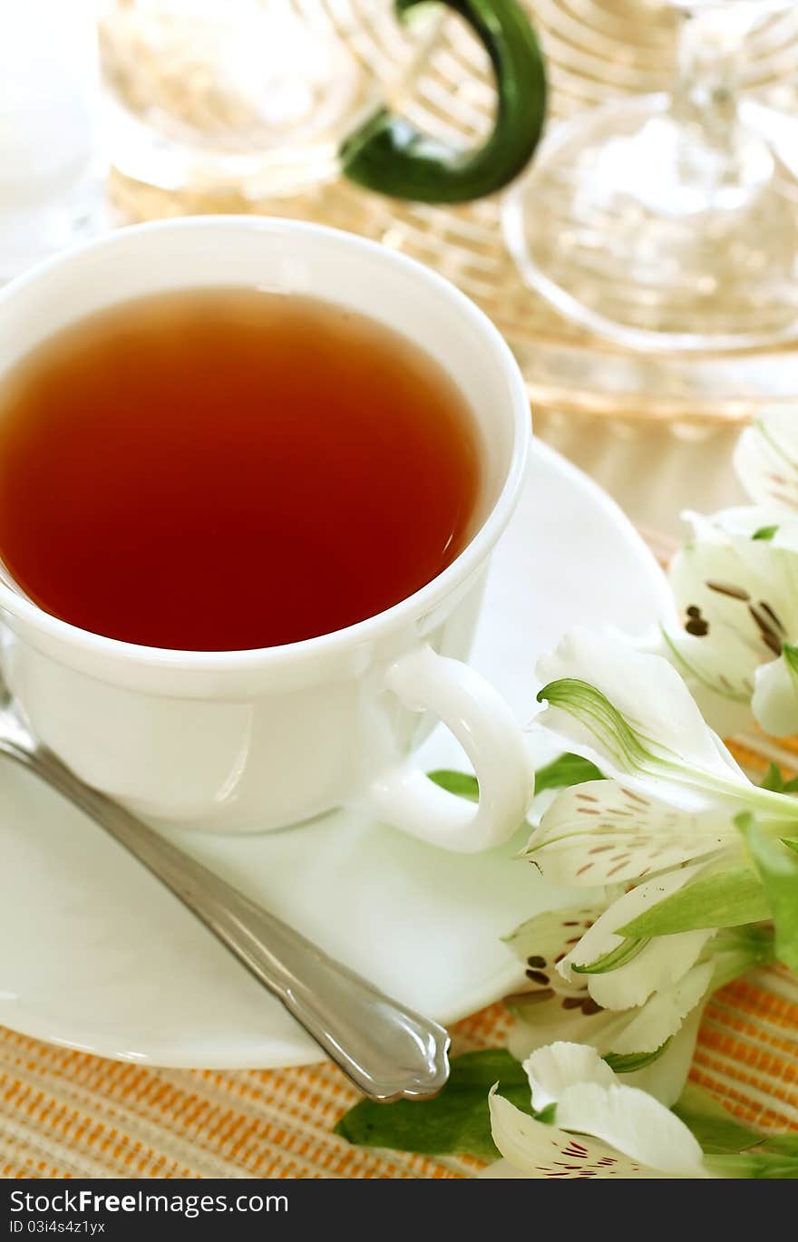 Cup of tea and flowers