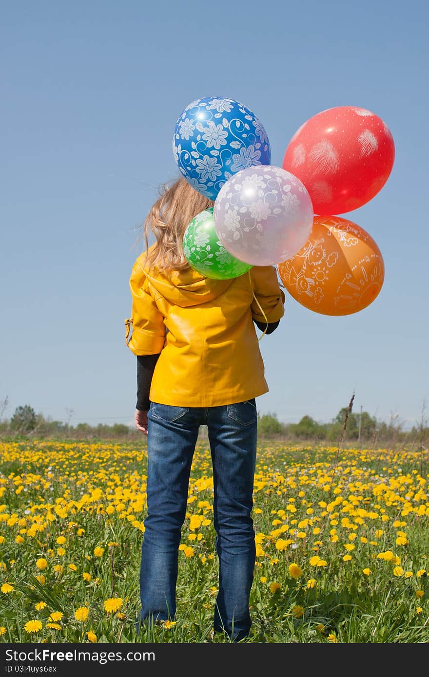 Woman with lots of balloons