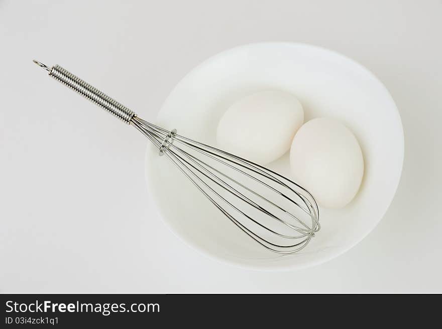 Eggs and a whisk