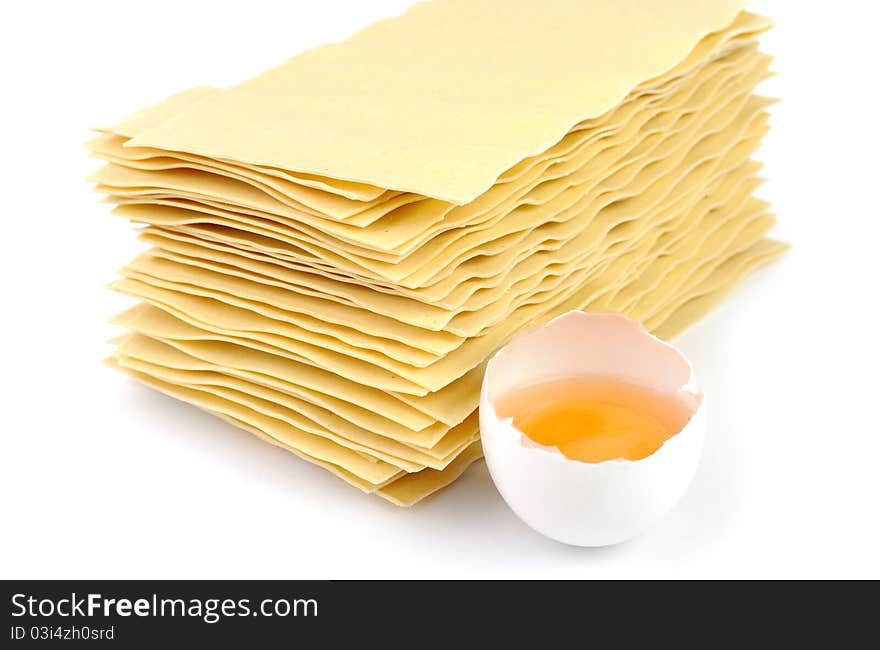 An image of yellow lasagna and an egg