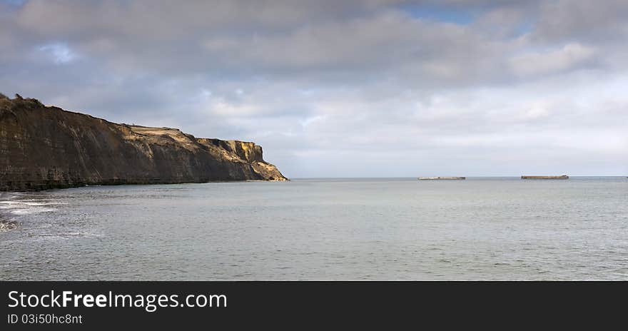 Famous coastline in Normady, France, panorama. Gold beach. Famous coastline in Normady, France, panorama. Gold beach.