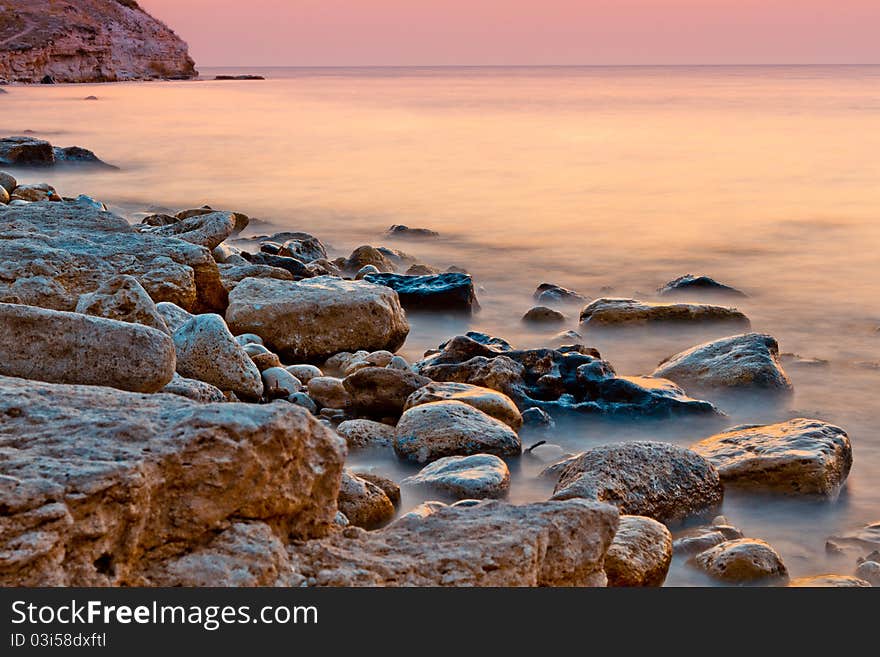 Sea decline, coast with the big stones