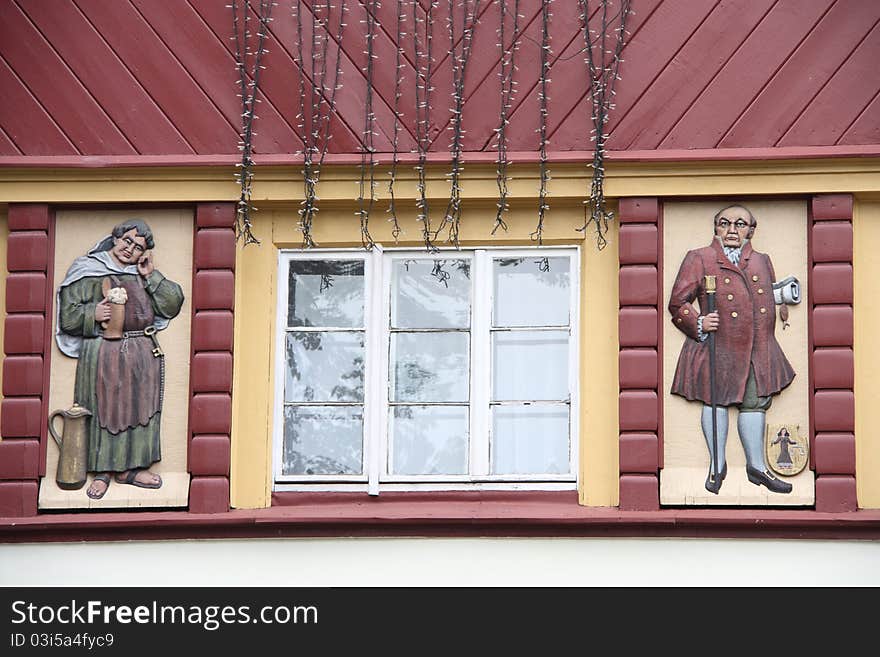 View of the beautifully decorated building in Karpacz, Poland. 

Karpacz is situated in the Karkonosze mountains and  is one of the most important centres for mountain hiking and skiing.