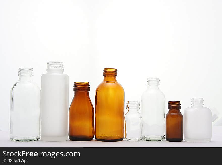 Glass bottle in white background