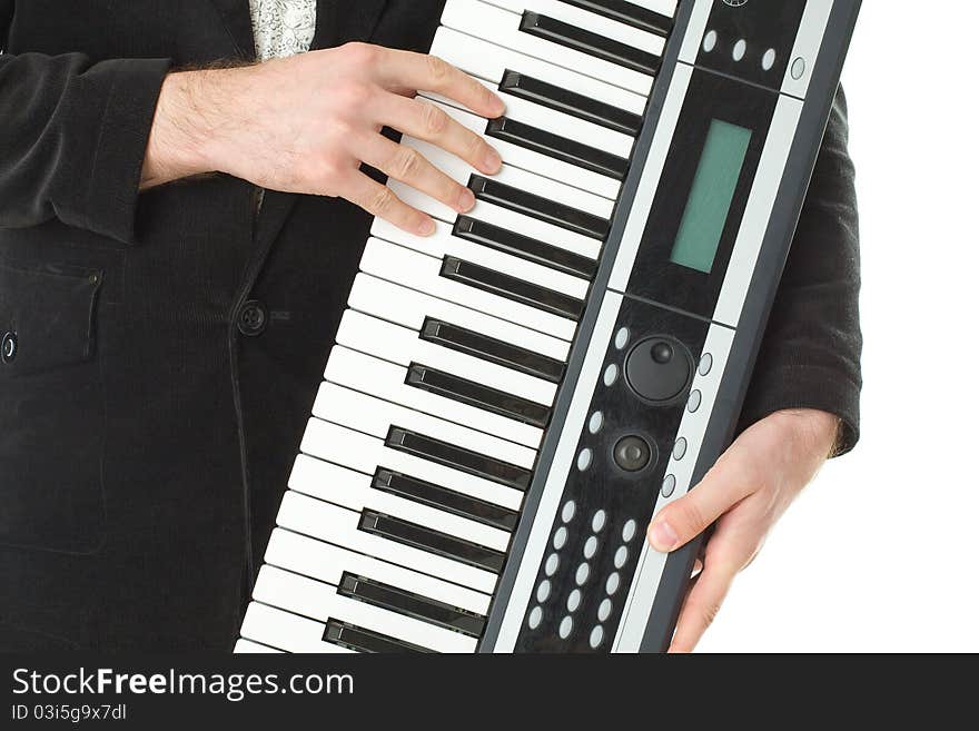 Music synthesizer in male hand. Music synthesizer in male hand