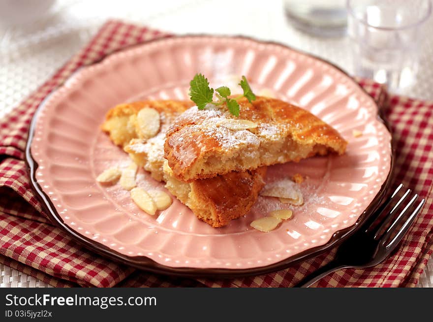 Cake filled with almond paste - closeup. Cake filled with almond paste - closeup