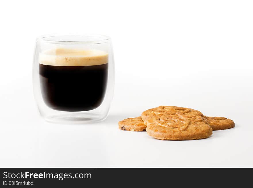 Expresso coffee with some cookies on a white background