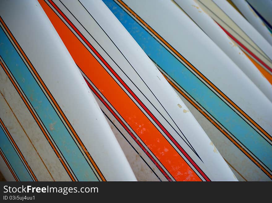 Row Of Striped Surfboards