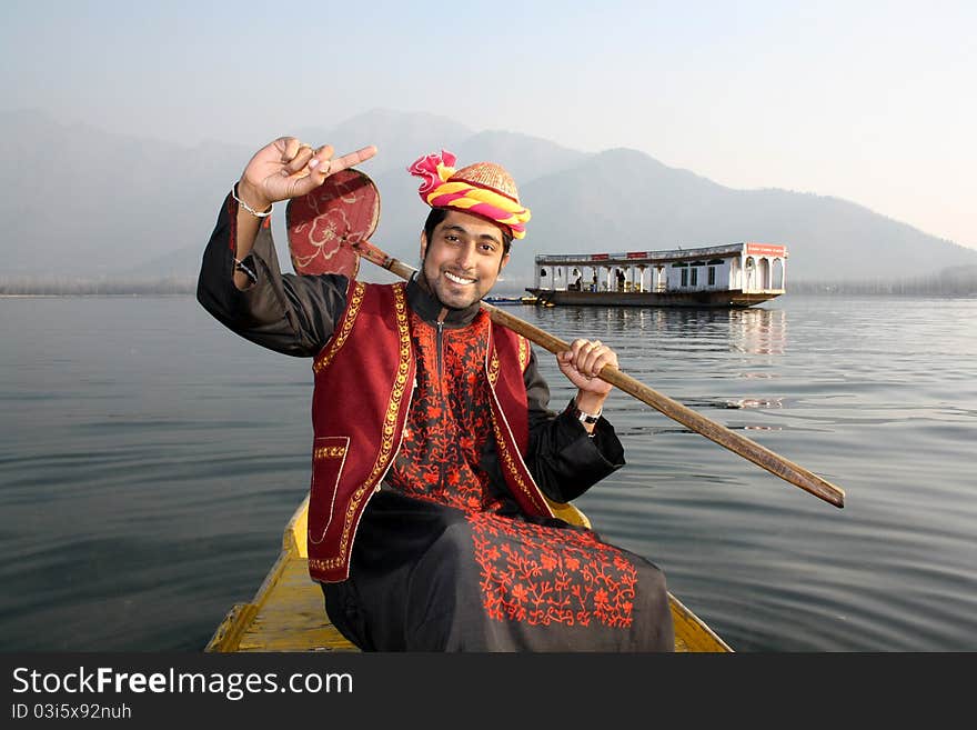 Rural Pathani Boy Singing On A Boat Hand Raised